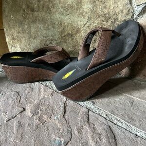 Volatile Frappachino wedge flip flops 
Bronze Python size 7